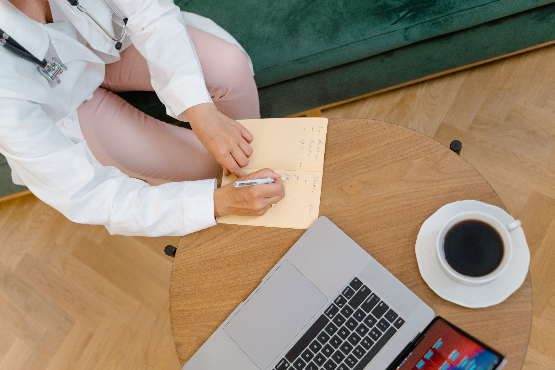 Clinician writing a personalised treatment plan